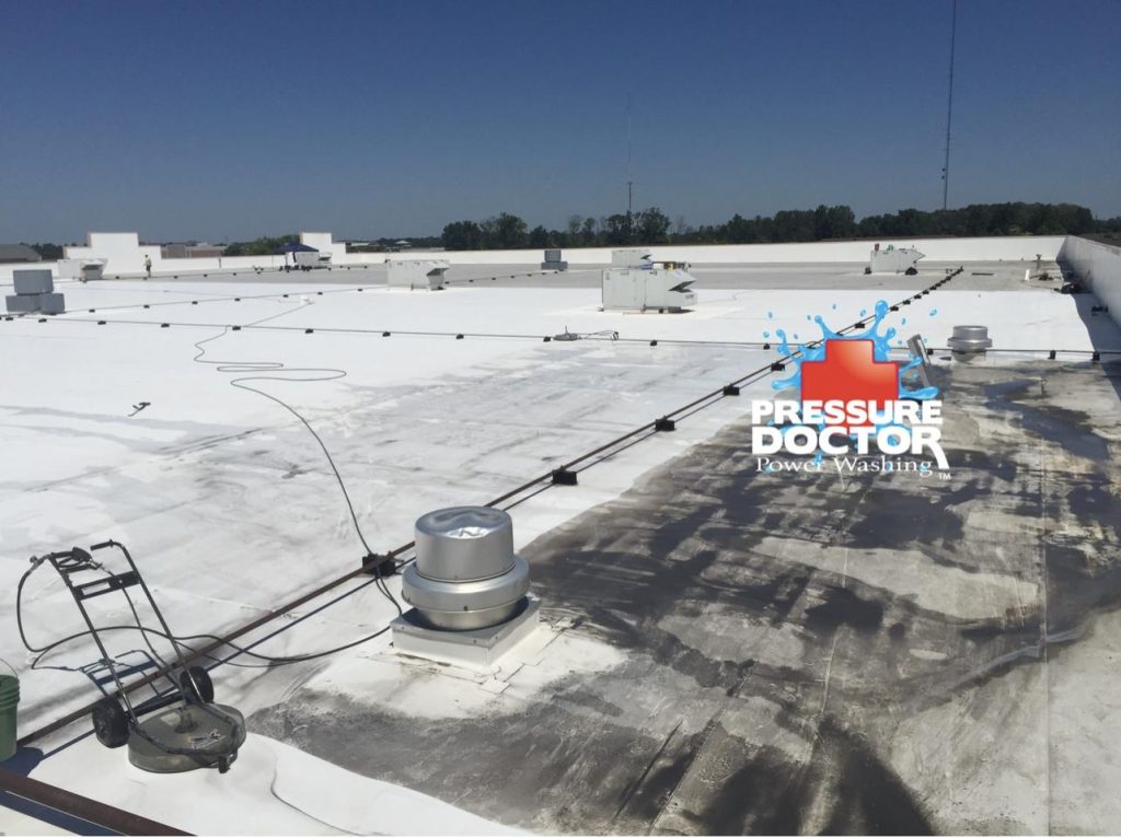 commercial roof cleaning before and after with pressure doctor logo