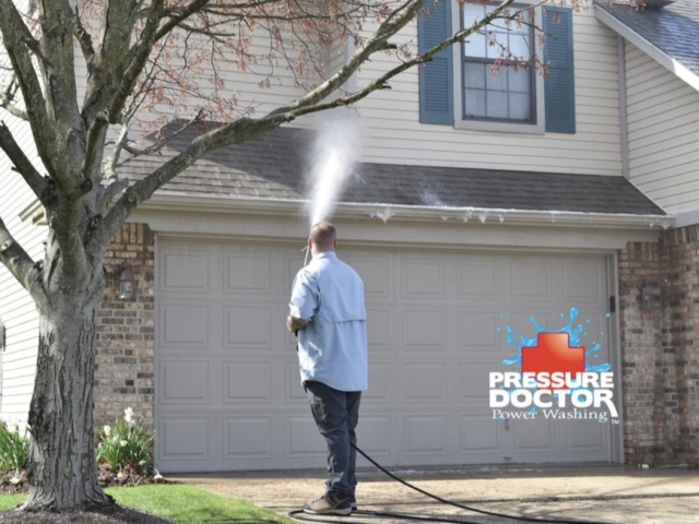 pressure doctor professional cleaning roof over garage Indianapolis, IN