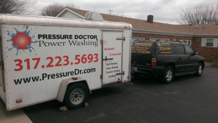 black pressure doctor work suv and white pressure doctor work trailer Indianapolis, IN