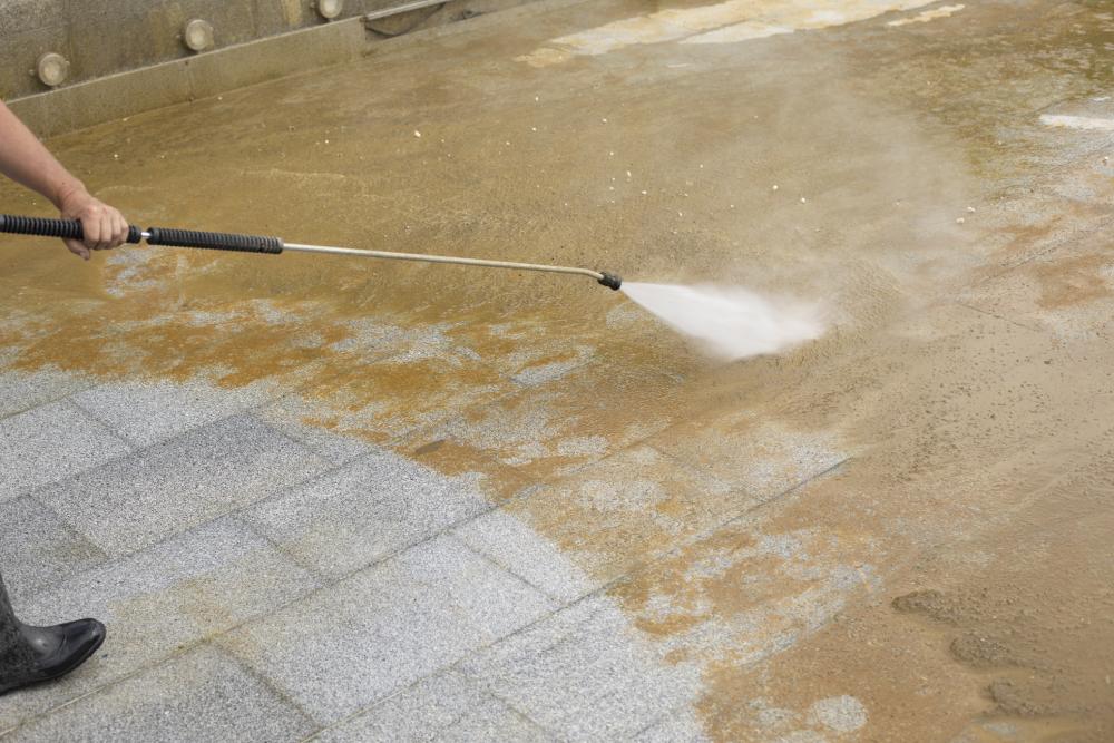 pressure doctor professional cleaning rust from concrete before and after Indianapolis, IN