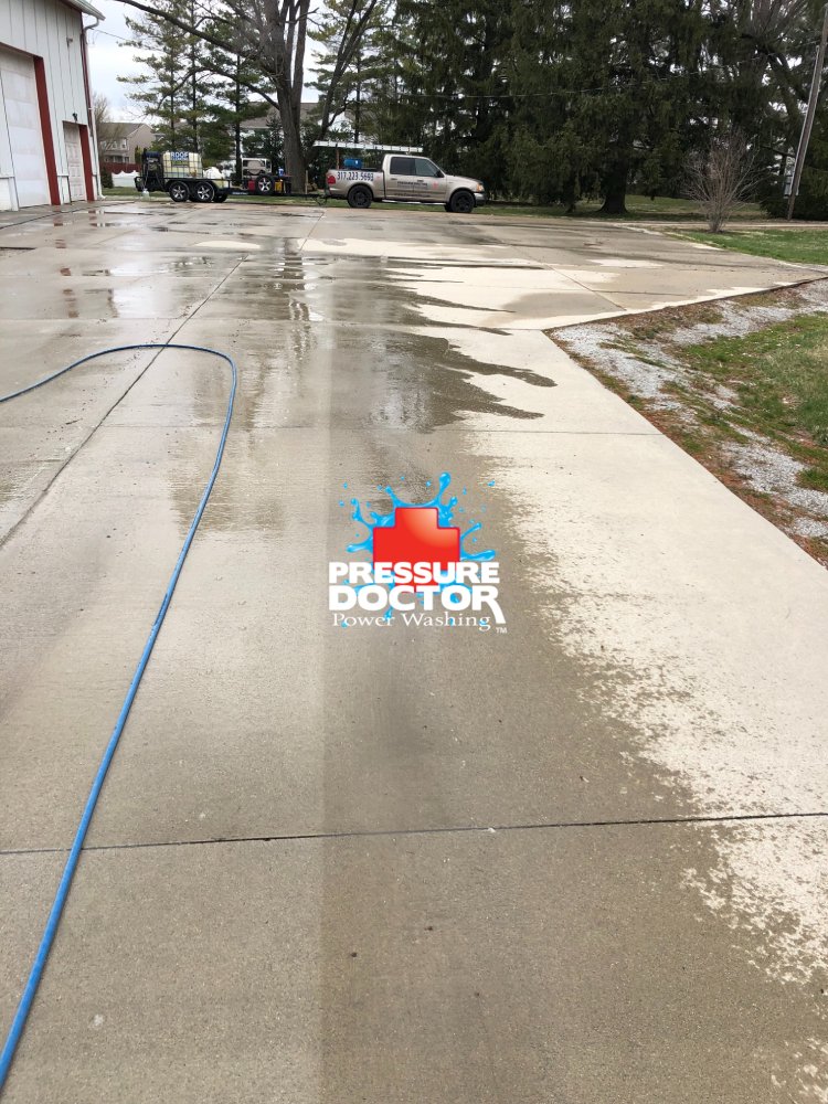 before and after clean concrete with cleaning hose